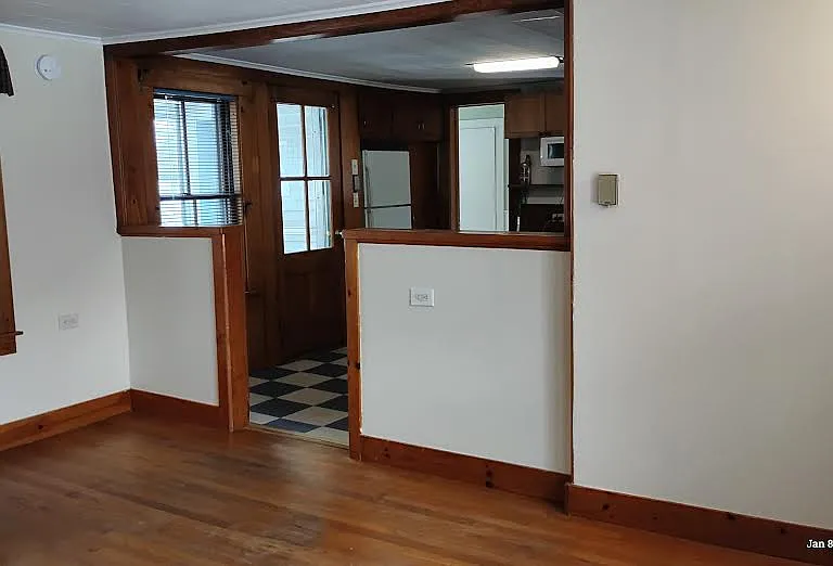 Plenty of outlets in the living room, nice size, lots of light with 4 windows.