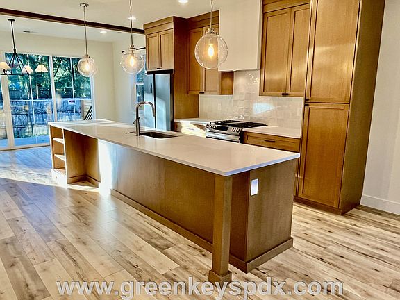 Kitchen with ceiling high cabinets