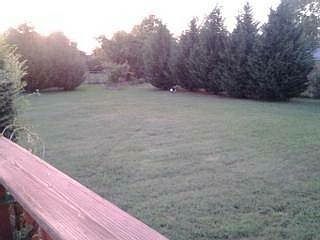 large, completely fenced back yard