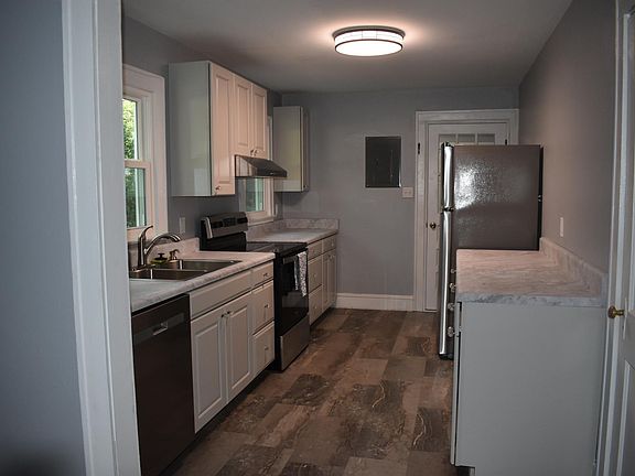 Kitchen - all brand new appliances, cabinets and flooring.