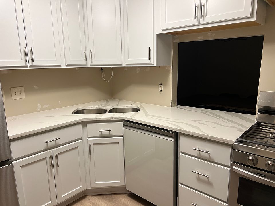 kitchen with pass through window. Granite counter tops and new appliances