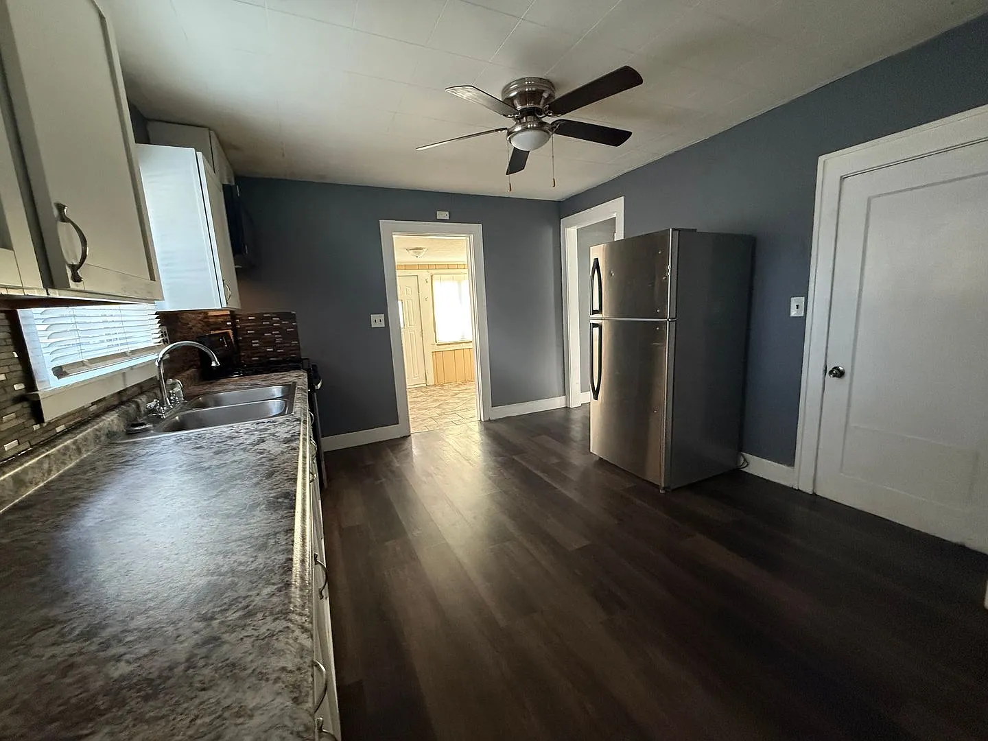 Spacious 2BR Home | Fenced Yard + Detached 2-Car Garage — Photo 3