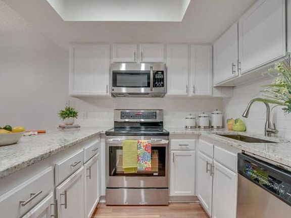 Kitchen with Granite Counters and Stainless Steel Appliances
