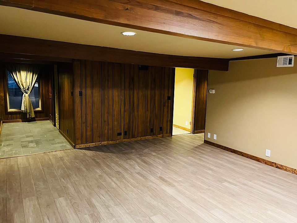 Standing in the living area. Kitchen is to the right. Unit entrance is located left. Bedrooms #1, #2, and the bathroom are to the right.