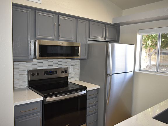 Closer view of the Kitchen and glass mosaic tile backsplash - installed Aug 2024