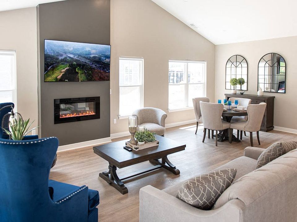 Interior of Champion Reserve Townhomes 2-bedroom end unit Great Room with fireplace.