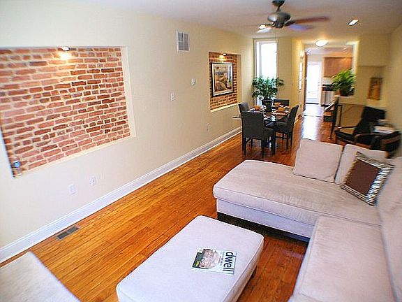 Lit recessed brick nooks for TV or artwork