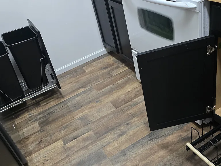 Secured Trash & Cabinet Area