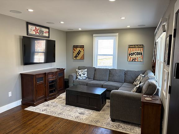 Comfortable living area with TV including an AppleTV, just sign in to your AppleTV account for access to all your apps.