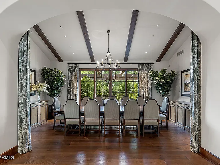Formal dining room offering a sophisticated setting for dinners and celebrations.