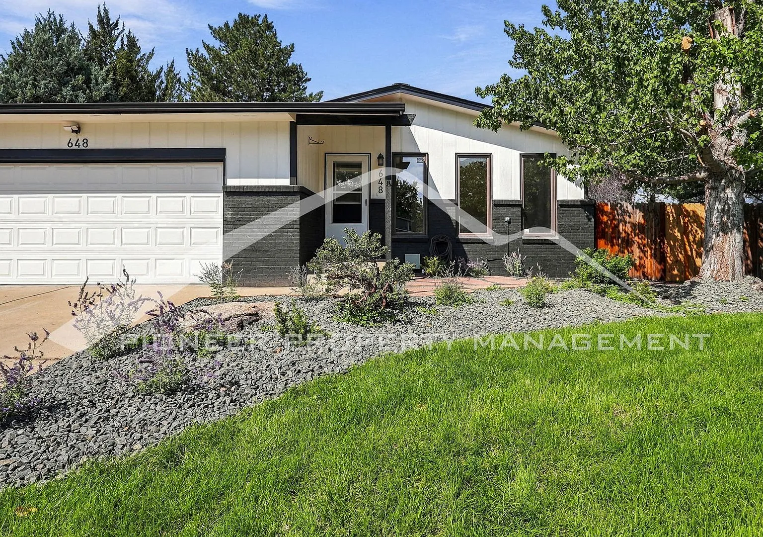 Fully Refreshed 4 Bedroom Home with New Landscape and 2 car Garage! — Photo 2