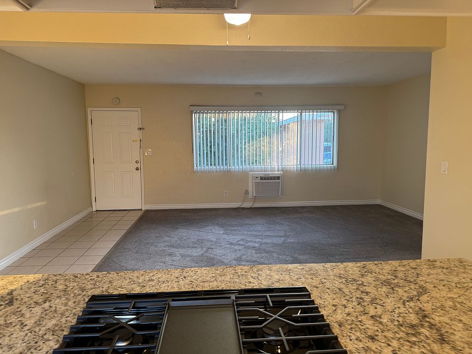 Standing in the kitchen looking towards living room. Very open floor plan.