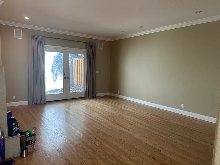 Living room area, with doors to rear patio