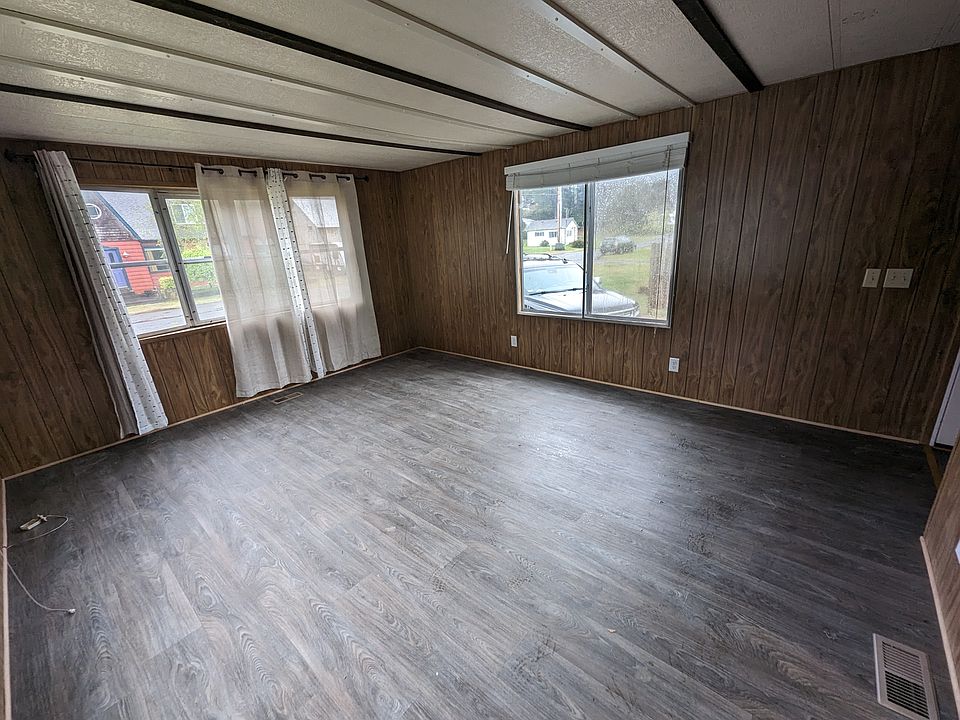 Living room-- southern exposure with huge windows on all three sides.