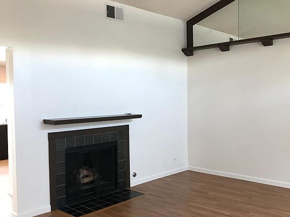 Living room view with gas fire place