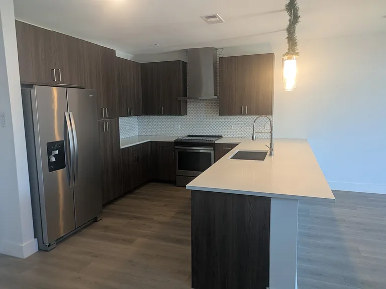 Kitchen with peninsula that can accommodate bar stools