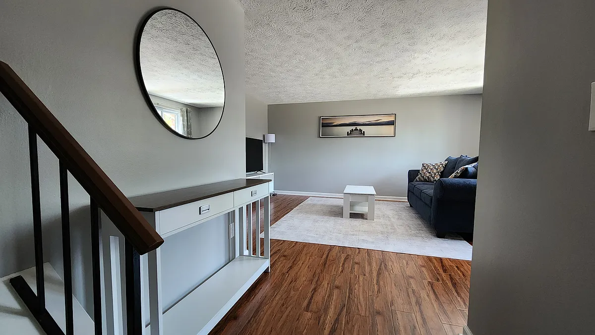 Photo 2 of 14 - 4313 Hemlock Cir - Allison Park, PA View of the living room from the entrance - 4313 Hemlock Cir