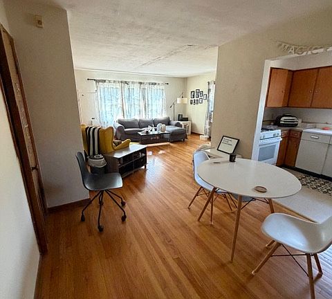 Dining room area facing living room & kitchen