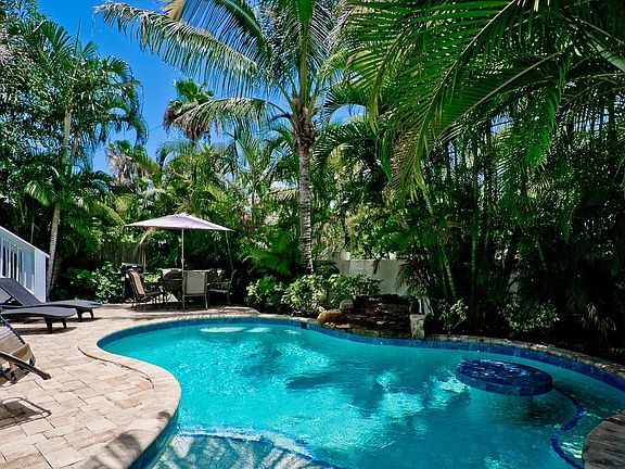 Pool with swim up table