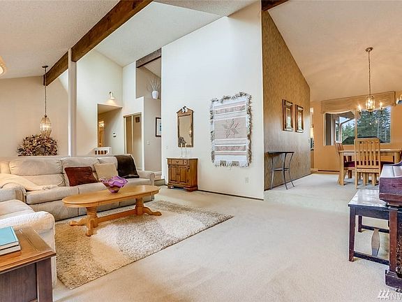 The open living room to dining room creates a great gathering space.