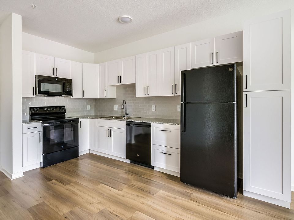 Kitchen area - self closing, spacious cabinets, wifi enabled stove, built-in microwave, refrigerator with icemaker