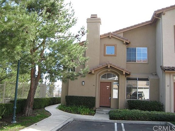 Privet end unit and walkway to side patio