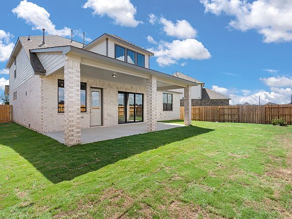 There is plenty of room for the kids to play and adults to relax in the backyard.