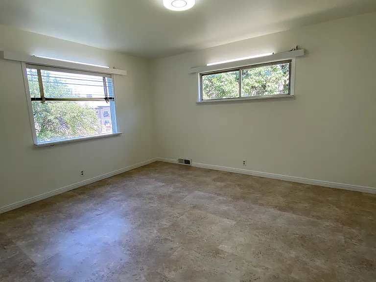 Large 2nd Bedroom: multiple windows and views outside. I used as an office.