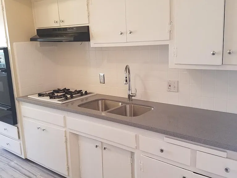 New ceramic tile floors, new quartz countertops and new wind