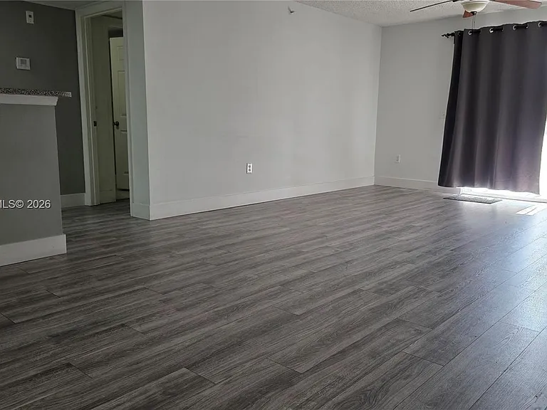 5011 Wiles Rd #203 — Photo 10