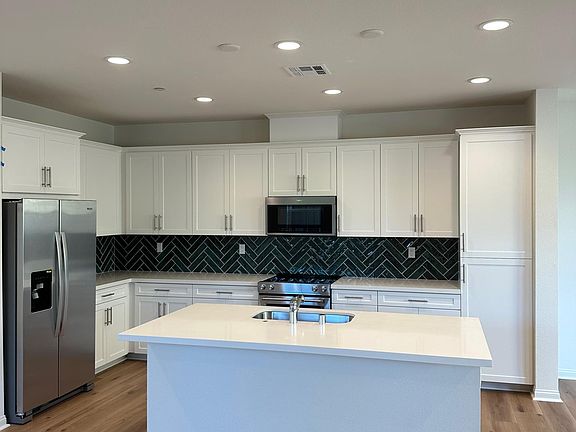 Open kitchen w/new appliances, new , new...slow close drawers.