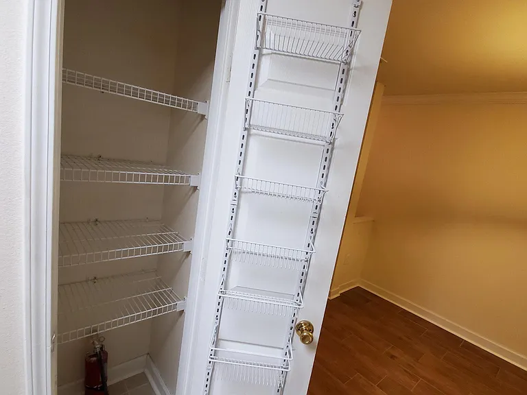 Pantry with extra storage provision on the door