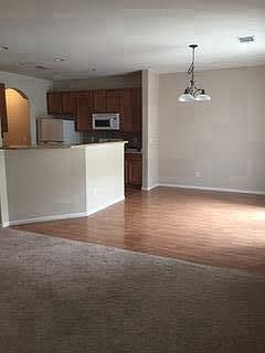 Living room looking toward eating space with patio door