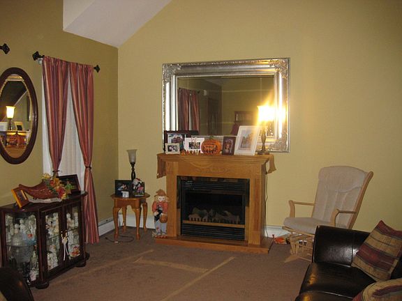 living room with vaulted ceiling