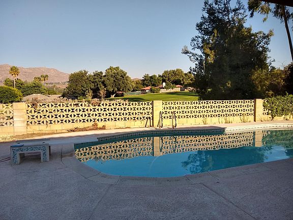 Pool with golf course view