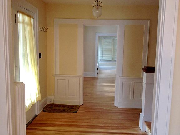 From dining, through foyer, towards living & sun room