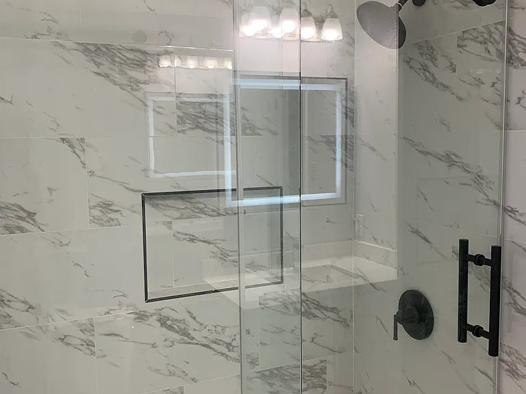 12. Shower- Remodeled smart bath with granite vanity and smart mirror, Walk-in standing shower with floor-to-ceiling ceramic