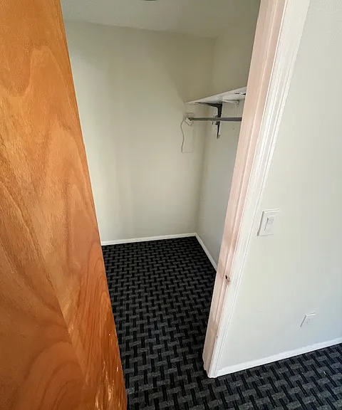 WALKIN CLOSET IN PRIMARY BEDROOM SUITE