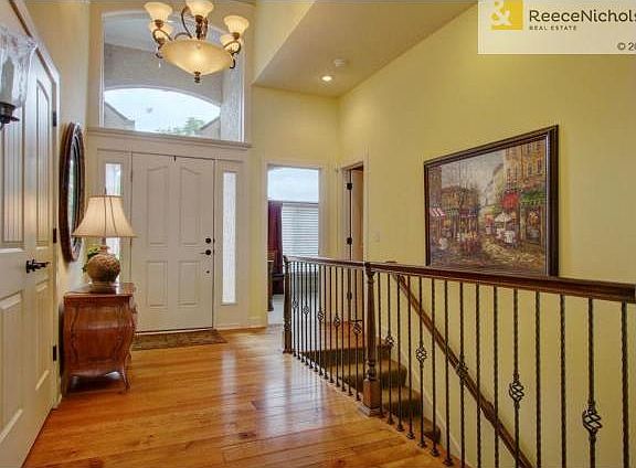 Vaulted entry with lots of natural light.