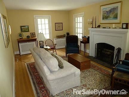Living Room w/ wood burning fireplace