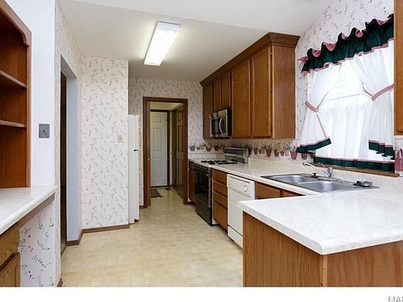 Tons of cabinets in our kitchen