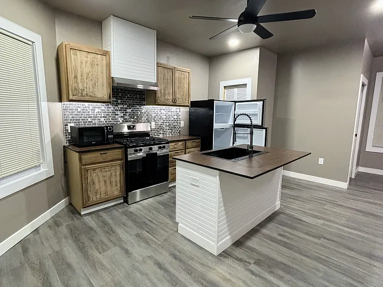 All new kitchen fixtures. Gas stove. Pot filler at stove for filling large pots
