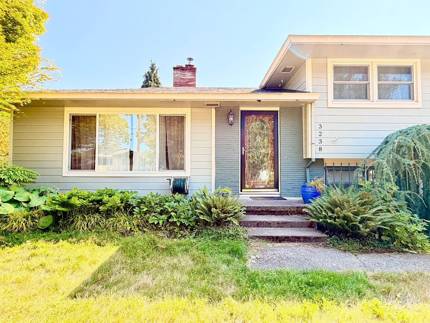 Charming Updated 1950s Home with Refinished Hardwoods & Large Fenced Yard Landscaping Included! — Photo 2