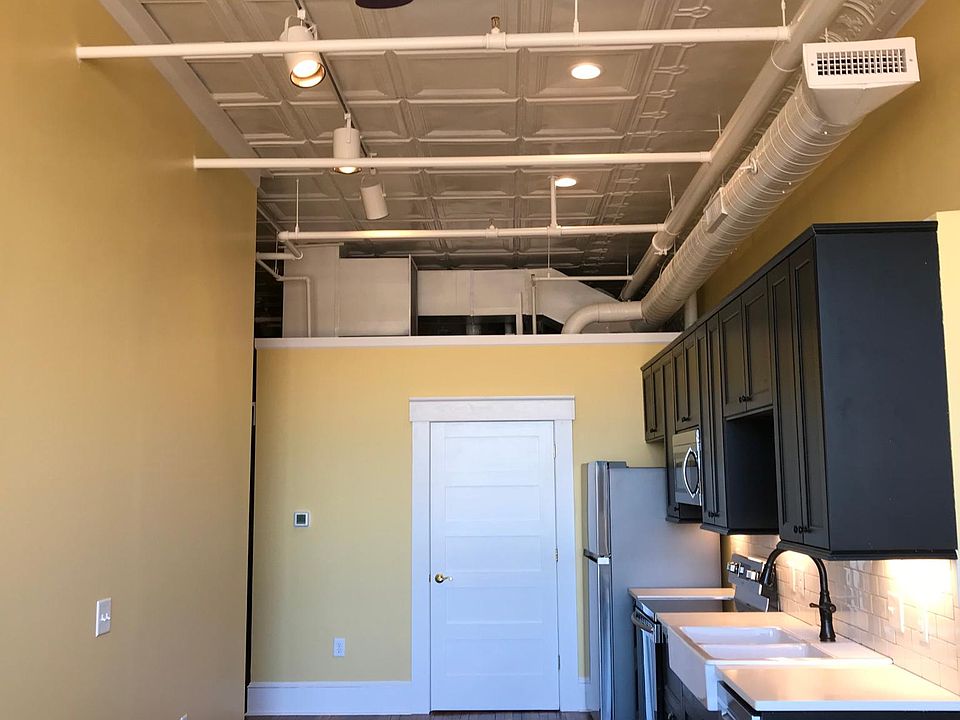 Heart pine floors, ceiling fans, track and recessed can lights (2700K). Press tin ceilings, state of the art HVAC. Insulated for sound and energy efficiency. (Shown-Finished one bedroom/bath kitchen)