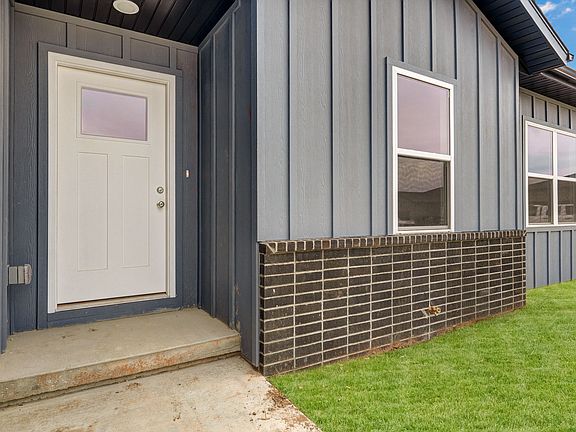 Grass is digitally added due to being new construction.