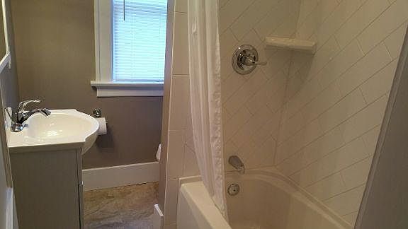 Upstairs bathroom with all new ceramic tile.