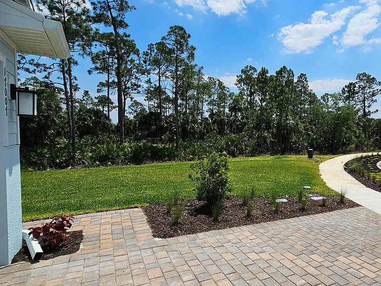 Front of home and pavers to front door