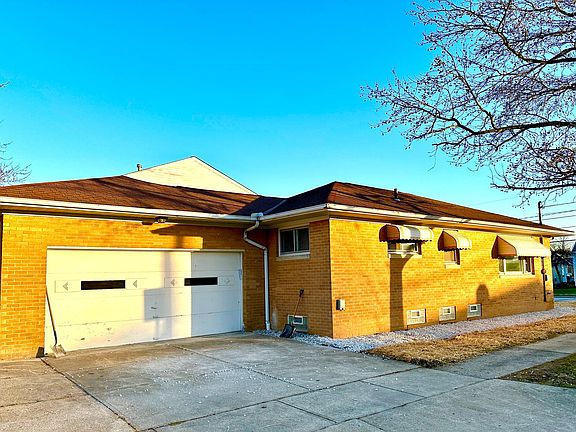 Attached 2-1/2 car garage with garage door opener.