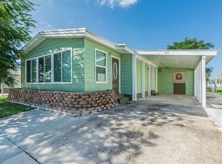 711 Hyacinth Cir, Barefoot Bay, FL 32976