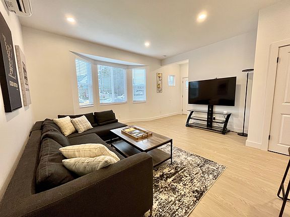 Our comfortable living room is the ideal space to curl up and watch your favorites.